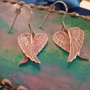 Ross Simon's angel wings earrings